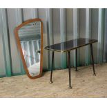 An Ercol style wall mirror and occasional table