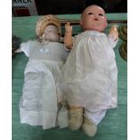 An early 20th Century Marseille bisque headed doll plus a bisque headed three faced doll with