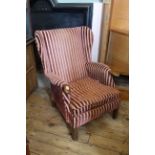 A vintage mahogany framed Parker Knoll armchair
