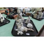 A selection of Lladro and Lladro style cat ornaments