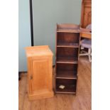 An Edwardian ash pot cupboard with carved panelled front plus an oak small bookcase