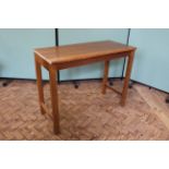 A 1950's oak laboratory table