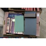 A box of Folio Society volumes including Pepys Diary and Ruskins The Stones of Venice