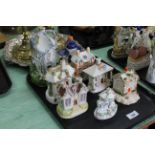 A good selection of 19th Century Staffordshire pastille burners including a large candle burner,