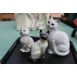 Three Beswick cat ornaments