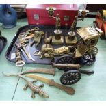 A brass horse and carriage, brass and metal gun carriage,