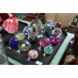 A tray of glass paperweights, mostly named including Murano, Caithness,