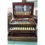 An oak cased canteen of silver plated cutlery,