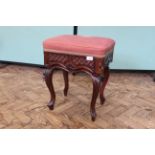 A late 19th Century mahogany piano stool on cabriole legs with patent rise and fall action by Chas