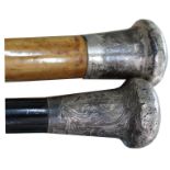 A silver topped walking cane with ebonised shaft plus a Malacca cane with sterling silver top