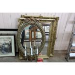 Three gilded framed mirrors, the largest with ornate frame 35" x 28",