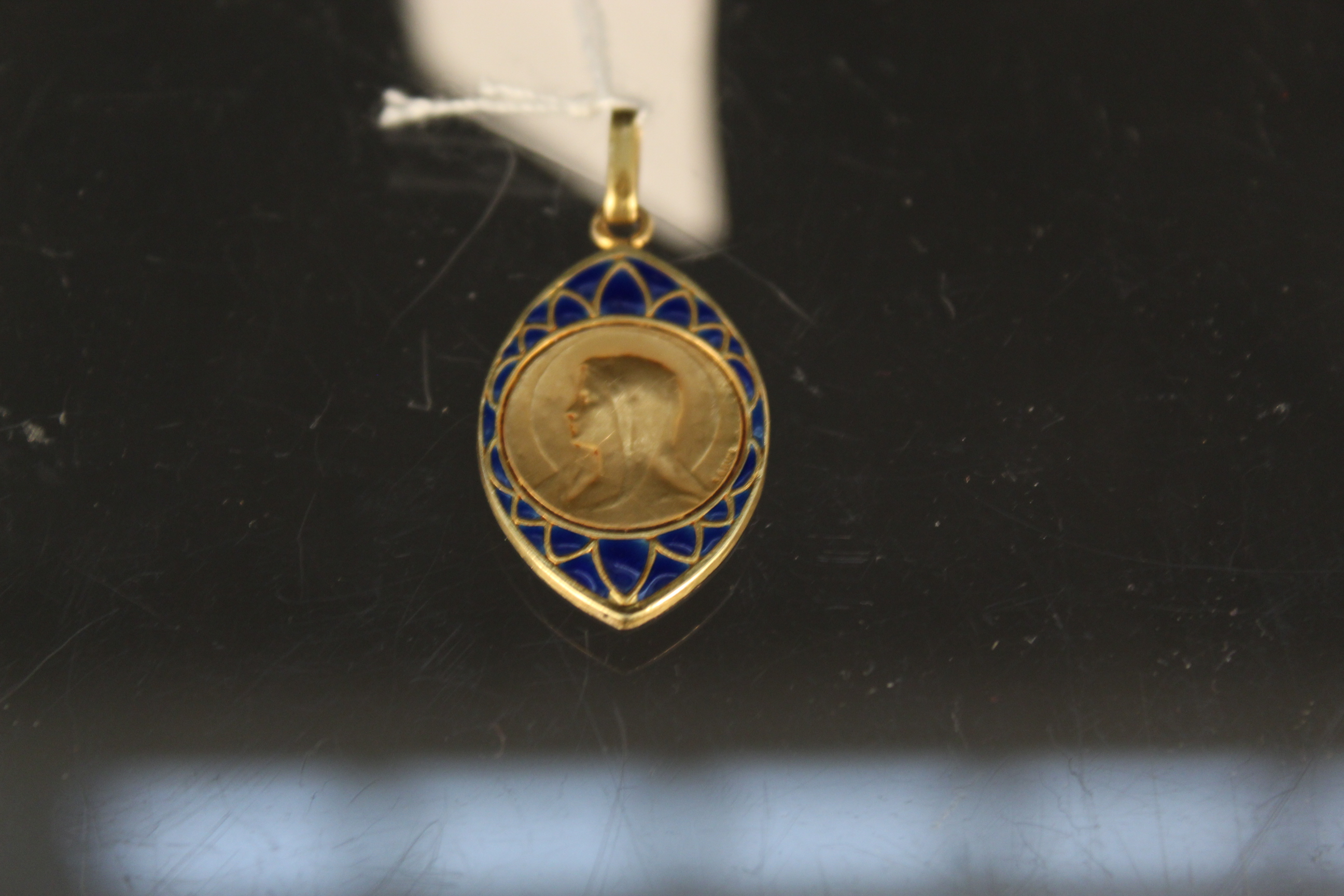 A French 18ct gold blue enamel decorated religious pendant, - Image 2 of 4