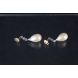 A pair of large simulated pearl and diamond drop earrings,