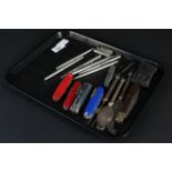 A selection of pens (including Parker pens), folding knives,