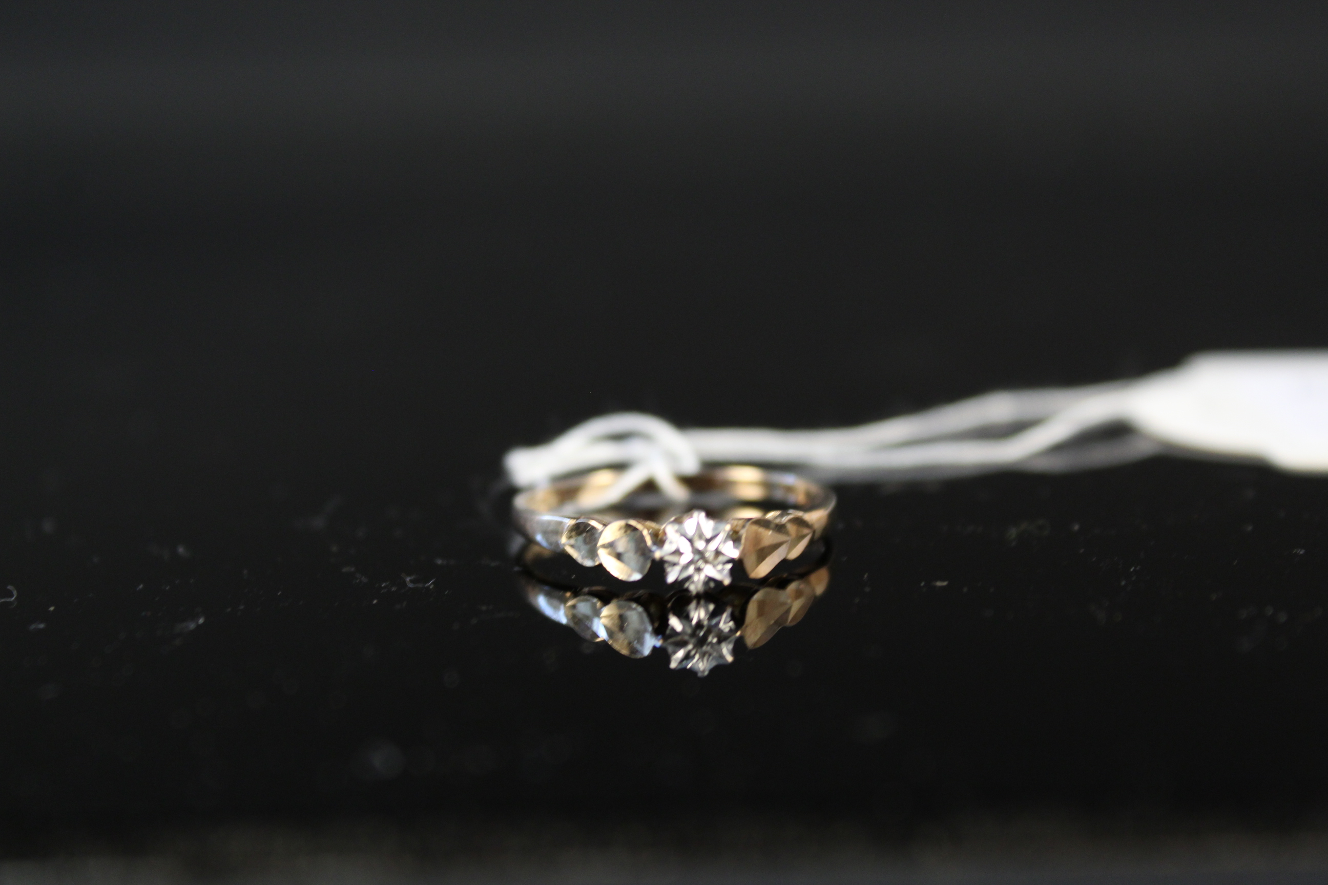 A 9ct gold illusion set diamond ring, - Image 2 of 4