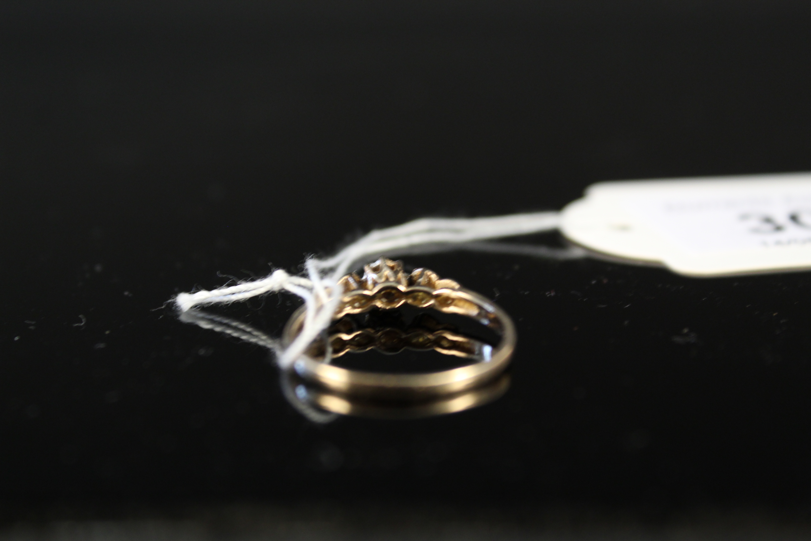 A 9ct gold illusion set diamond ring, - Image 3 of 4