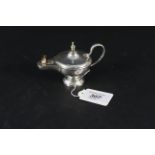 A Silver Officer's Mess table lighter in the form of a Roman oil lamp with serpent handle,