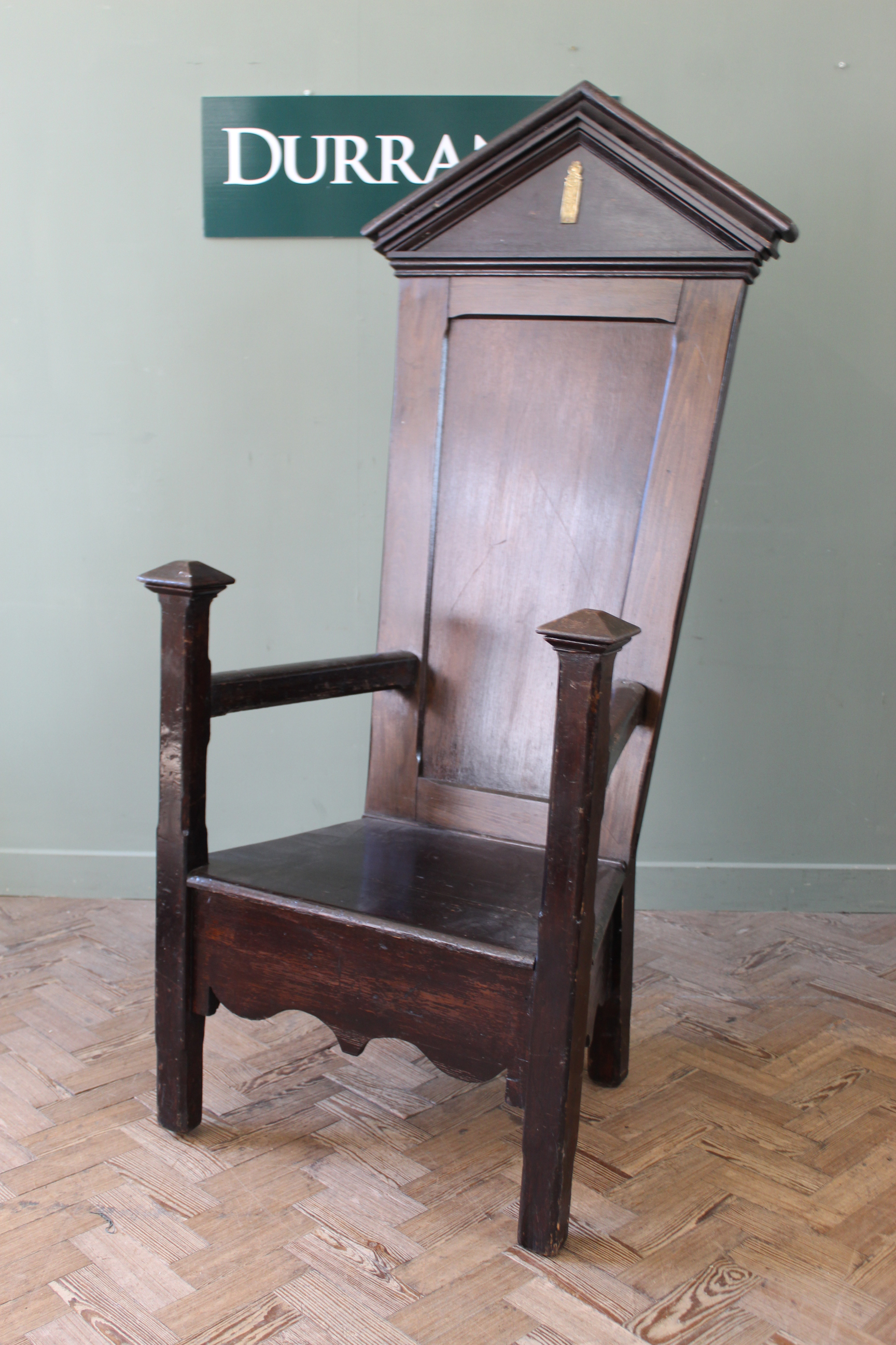 An Edwardian oak and beech master's chair,