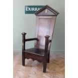 An Edwardian oak and beech master's chair,