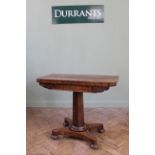 A William IV mahogany card table on hexagonal column and platform base (top as found),