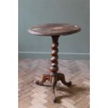 A mid Victorian carved mahogany wine table