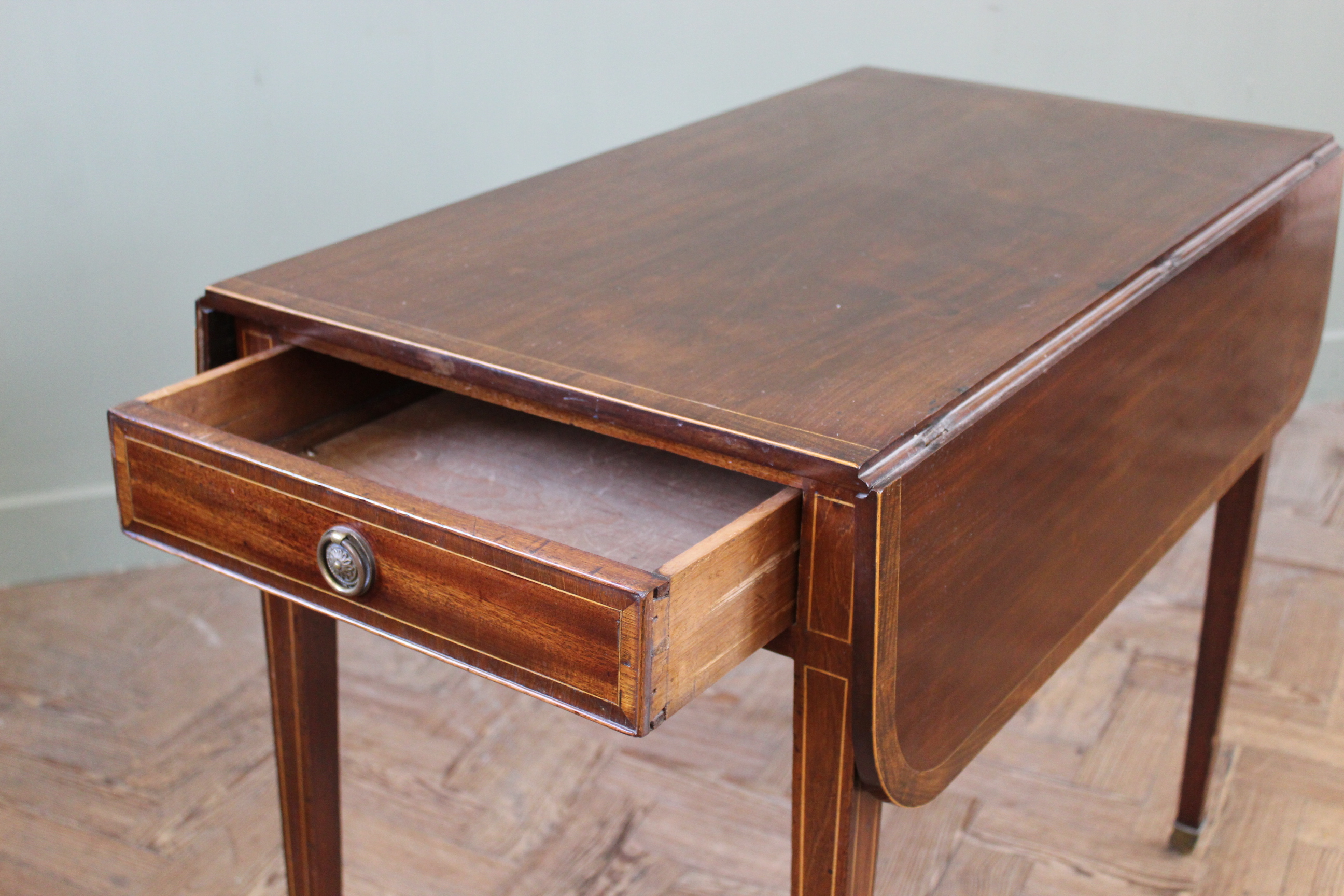An early 19th Century mahogany inlaid Pembroke table on square tapered legs and brass box castors, - Image 2 of 3