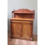 A mid 19th Century mahogany chiffonier with shelved upstand