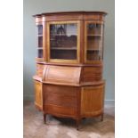 An Edwardian inlaid satinwood serpentine bureau cabinet,