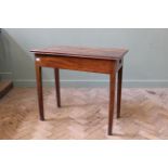 An early 19th Century mahogany tea table with end drawer (top missing),