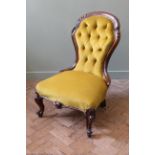 A Victorian ladies mahogany framed spoon back chair on cabriole legs,