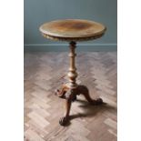 A mid Victorian walnut tripod table,