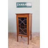 An Edwardian inlaid mahogany display cabinet with astragal glazed door on square tapered legs,