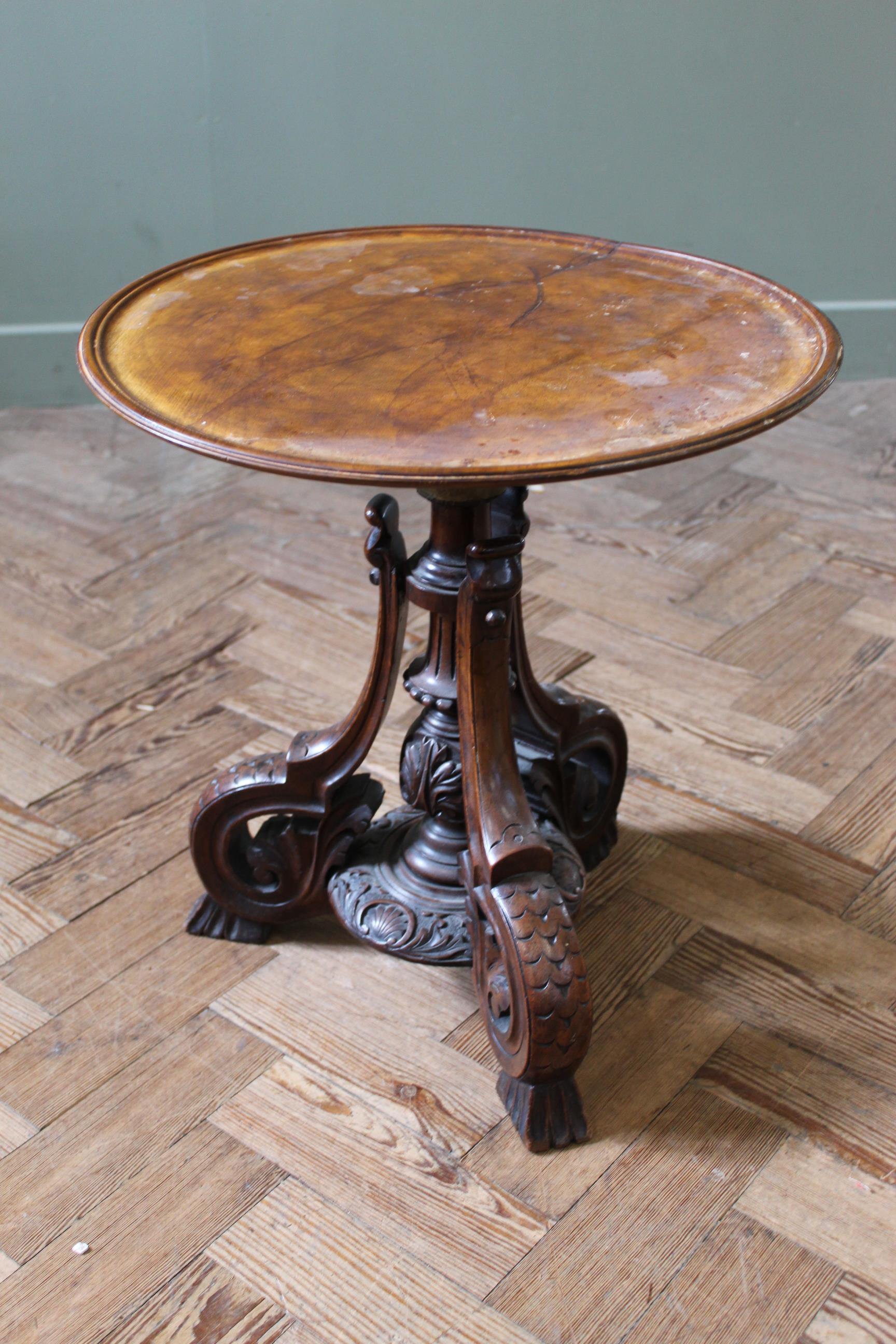 A mid 19th Century walnut tray top coffee table on a carved tripod base (adapted),