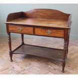 A mid 19th Century mahogany two drawer washstand with under tier,