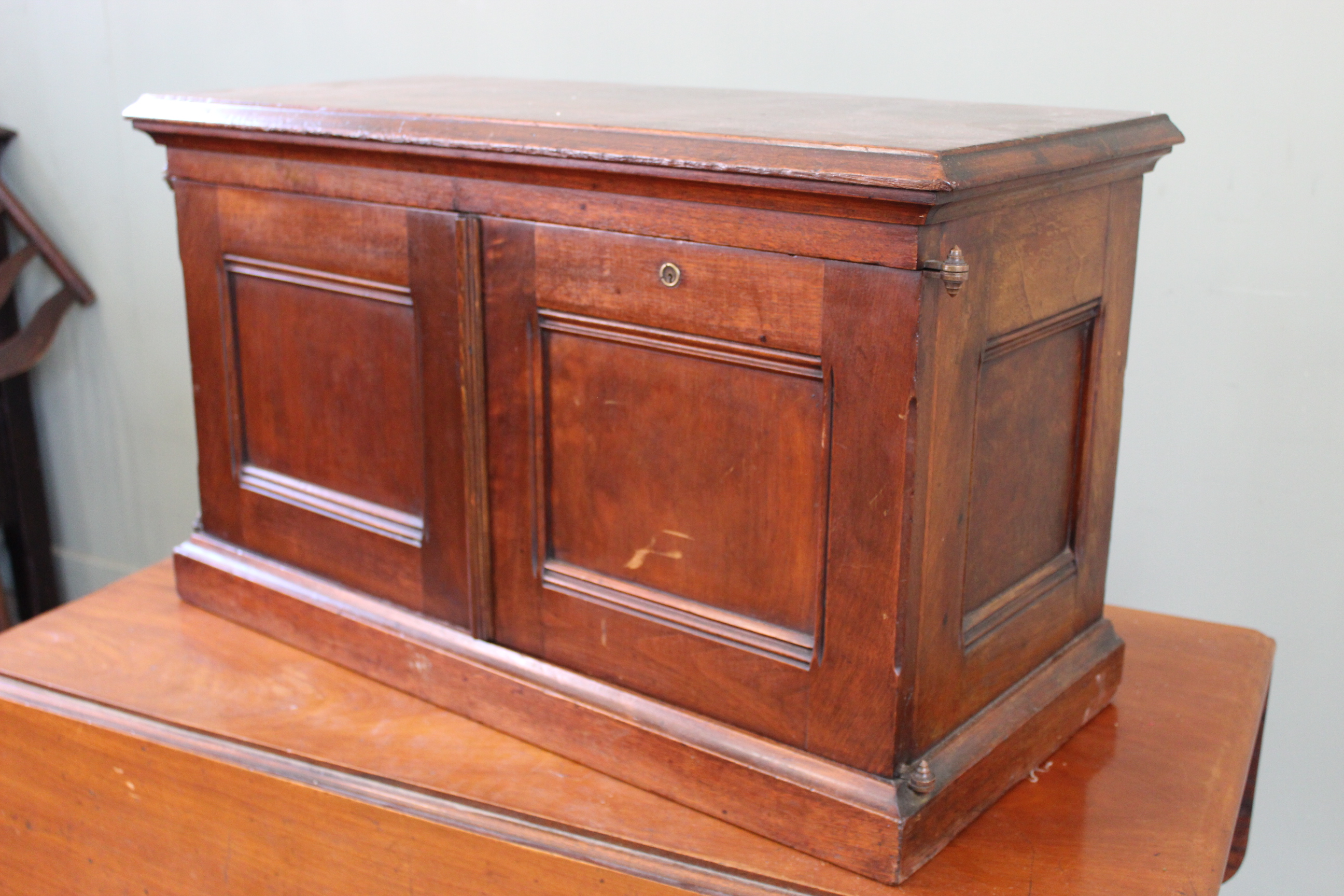 A late 19th Century mahogany two door desk top cabinet with shelved interior with three drawers, - Image 3 of 3