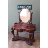 A mid 19th Century mahogany Duchesse dressing table,