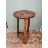 An Arts and Crafts Liberty style oak occasional table with tile insert top, 15 3/4" dia