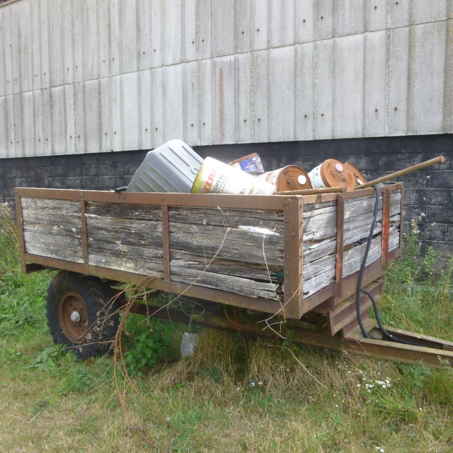 Scrap wooden tipping trailer plus heap of scrap