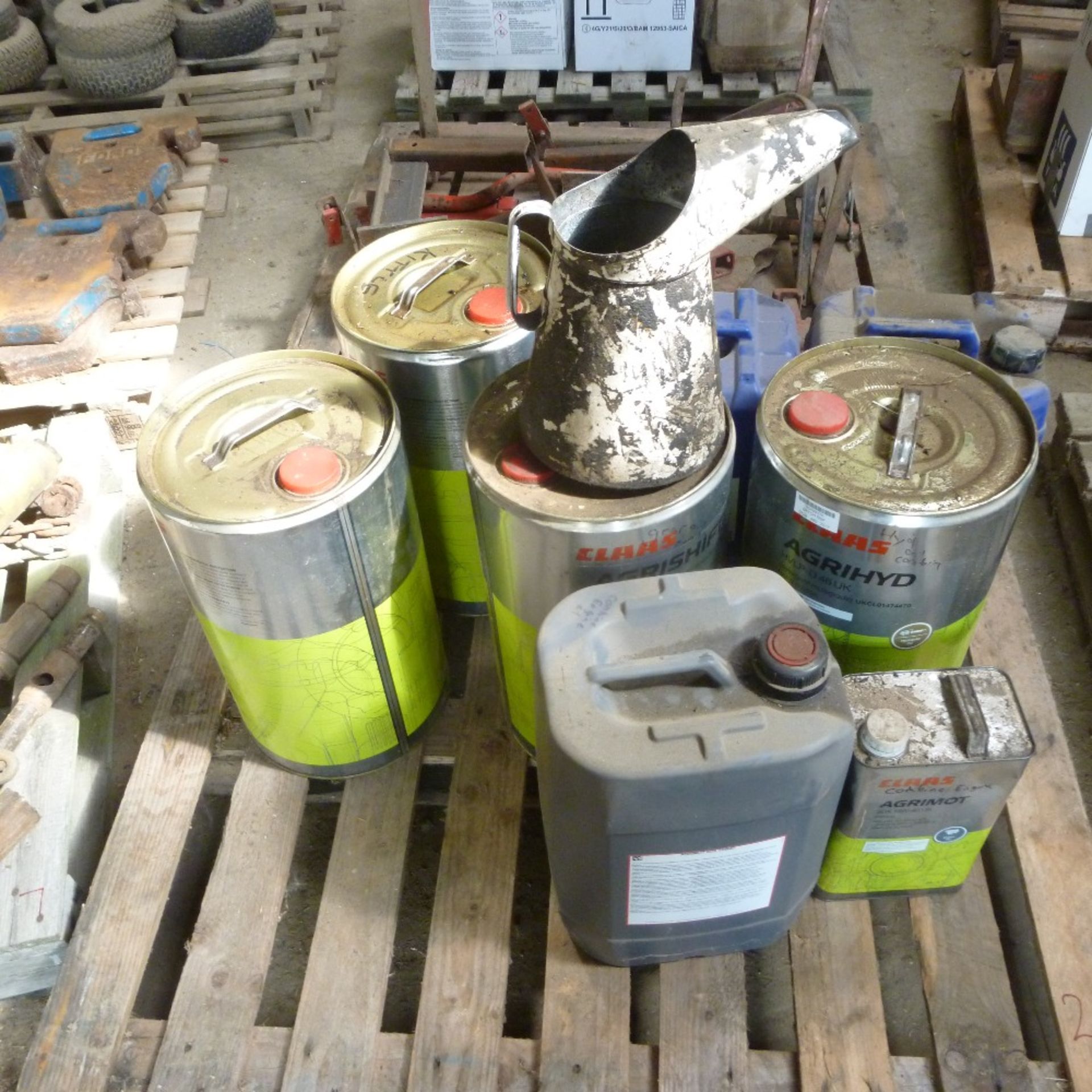 Pallet of assorted gear and hydraulic oil,