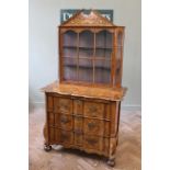 A 19th Century Dutch marquetry cabinet on chest, walnut veneered with marquetry decoration,