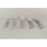 A part canteen of silver William Huttons cutlery consisting of six soup spoons, five serving spoons,