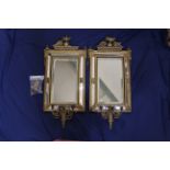 A pair of 19th Century three branch continental girandoles with bevel glass and mirror inserts in a