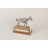 A silver horse trophy,