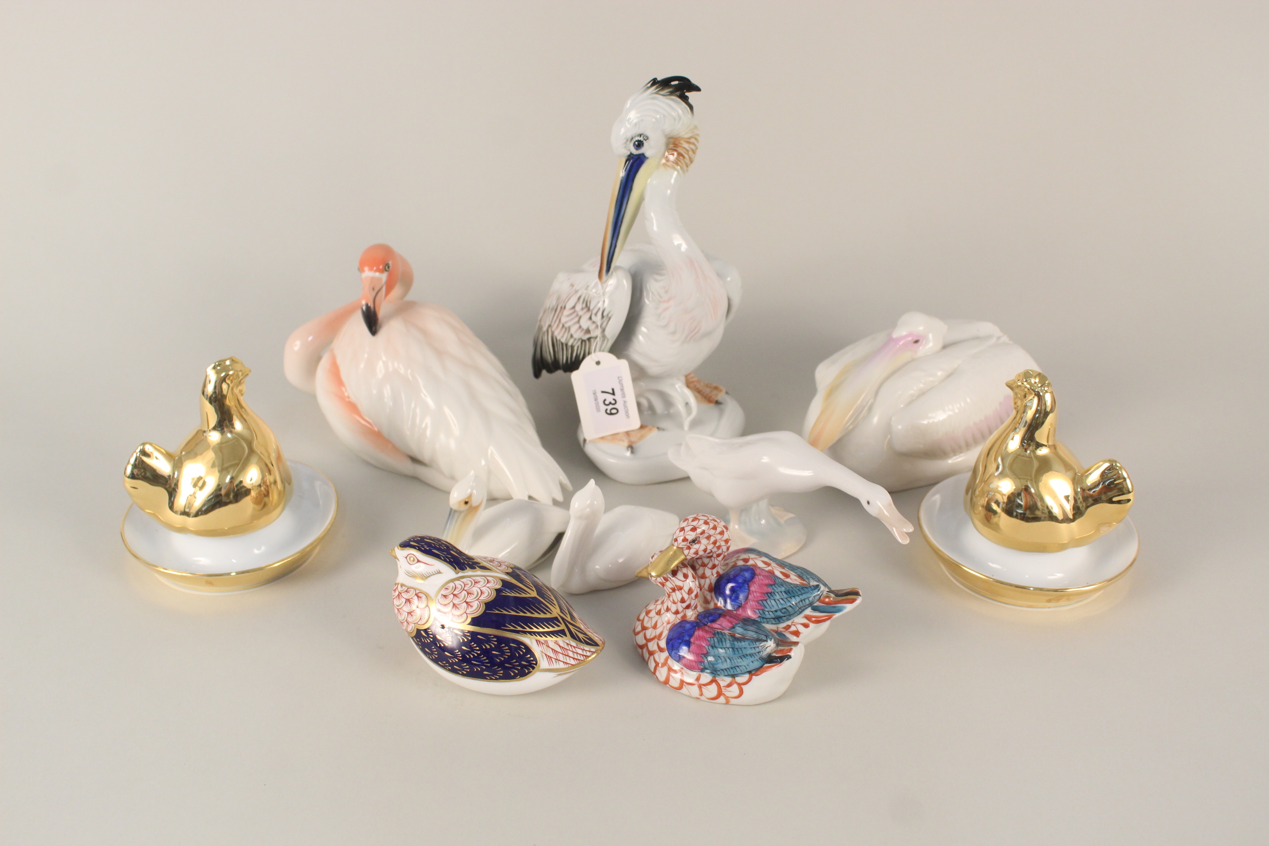 Various porcelain bird figurines including Crown Derby grouse,