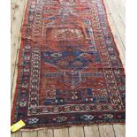 A Caucasian Kazak rug (worn condition) 90" x 43"