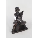 An early 20th Century bronze after a Roman sculpture of a child wrestling with a goose, unsigned,