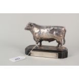 A Victorian Scottish silver model of a bull mounted on a wooden base with presentation inscribed