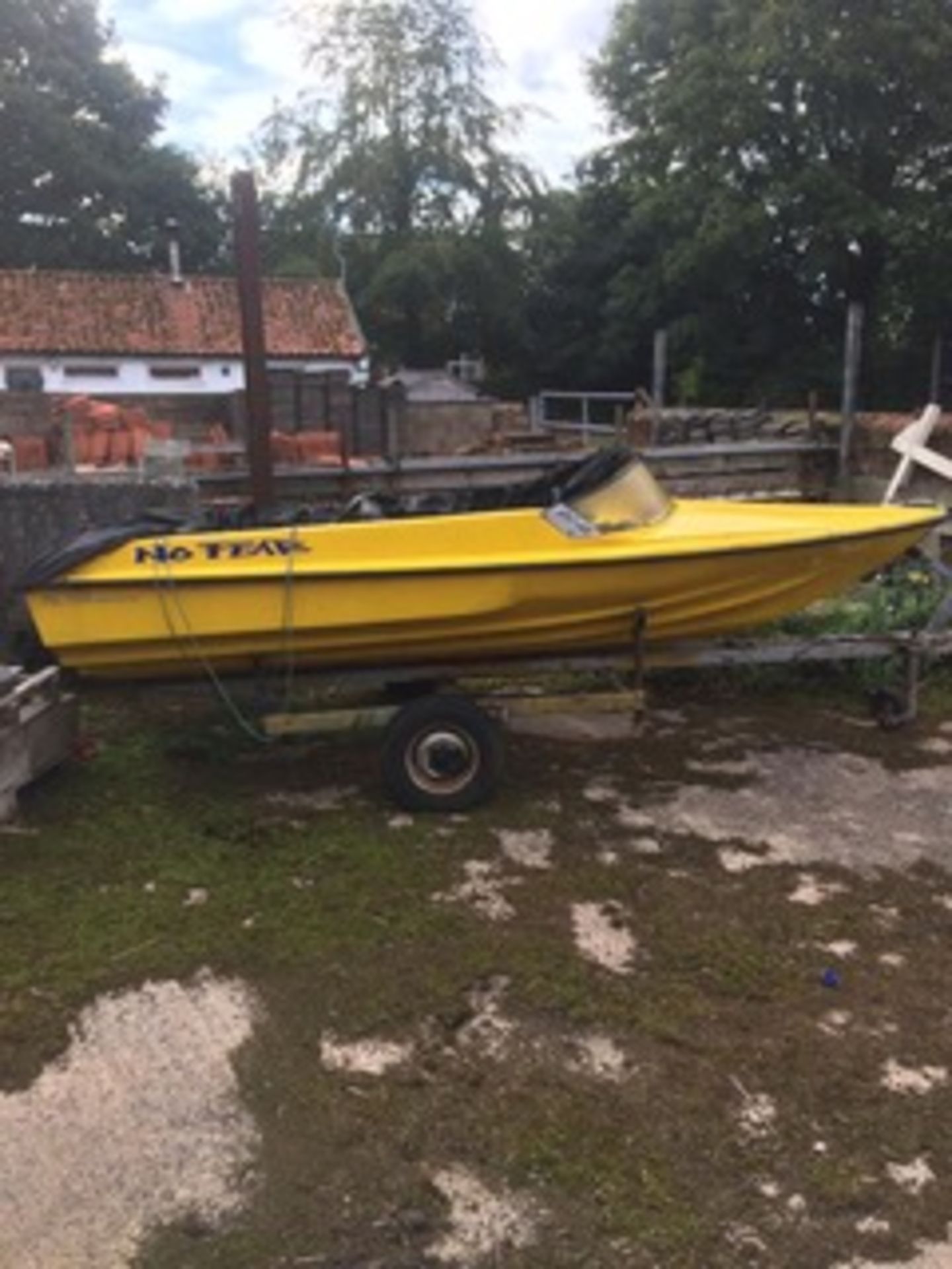 Fibre glass boat shell and trailer. Stored near Beccles, Suffolk. No VAT on this item.