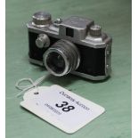 A miniature Kiku 16 Model II camera