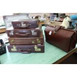 Five vintage brown leather briefcases plus a Gladstone style bag